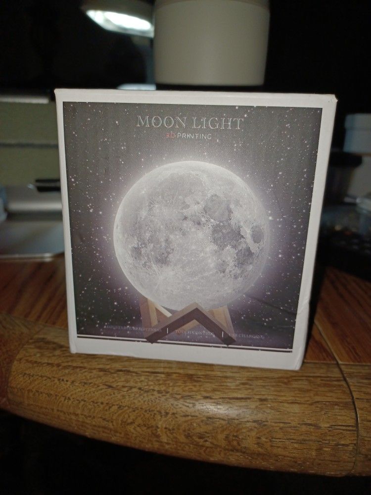 MOON LIGHT..HAS REMOTE CONTROL WITH CHANGING COLORS AND DIFFERENT SEQUENCES