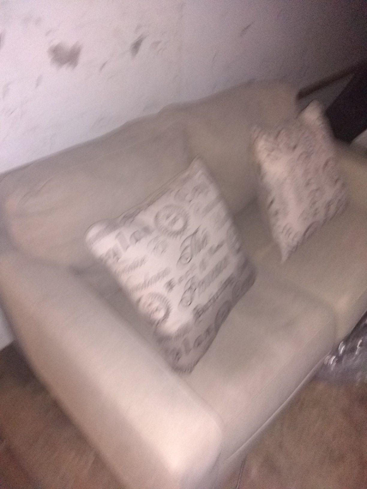 Beige love seat for sale