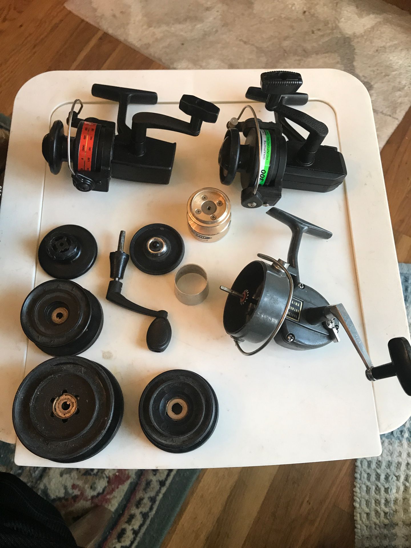 Fishing reel parts lot, Dam Quick, Shakespeare and Daiwa