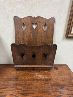 Antique wall mount magazine rack
