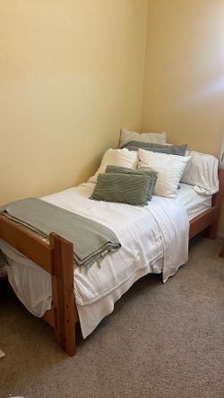Wooden bunk bed (or two twin size bed frames + mattresses)
