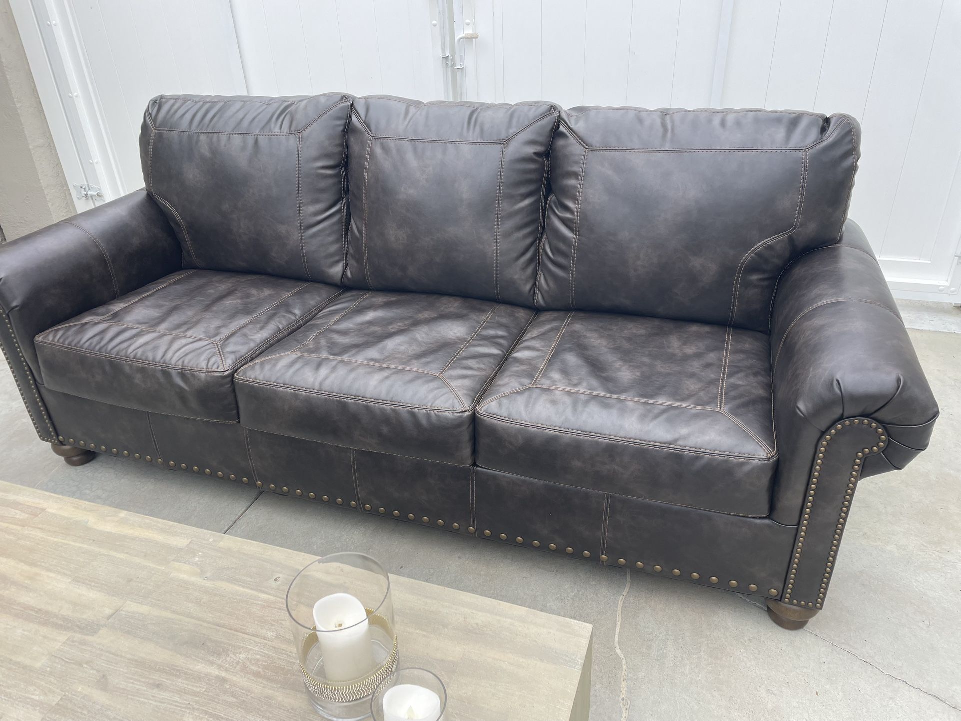 leather sofa ashley select furniture