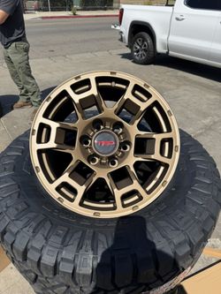 17” TOYOTA WHEELS AND TIRES