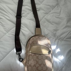 coach shoulder bag Coach Ethan Pack or Racer Sling Pack in Signature Canvas.