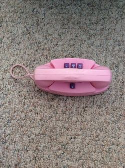Vintage pink plastic push button play phone