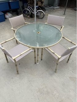 Glass table set with chairs