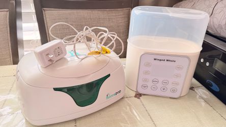 Calentador de toallas húmedas para bebé y calentador de biberón para la leche del bebé los dos están súper limpios los dos los estoy dando a 30