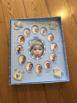 Baby boy photo album and milestone