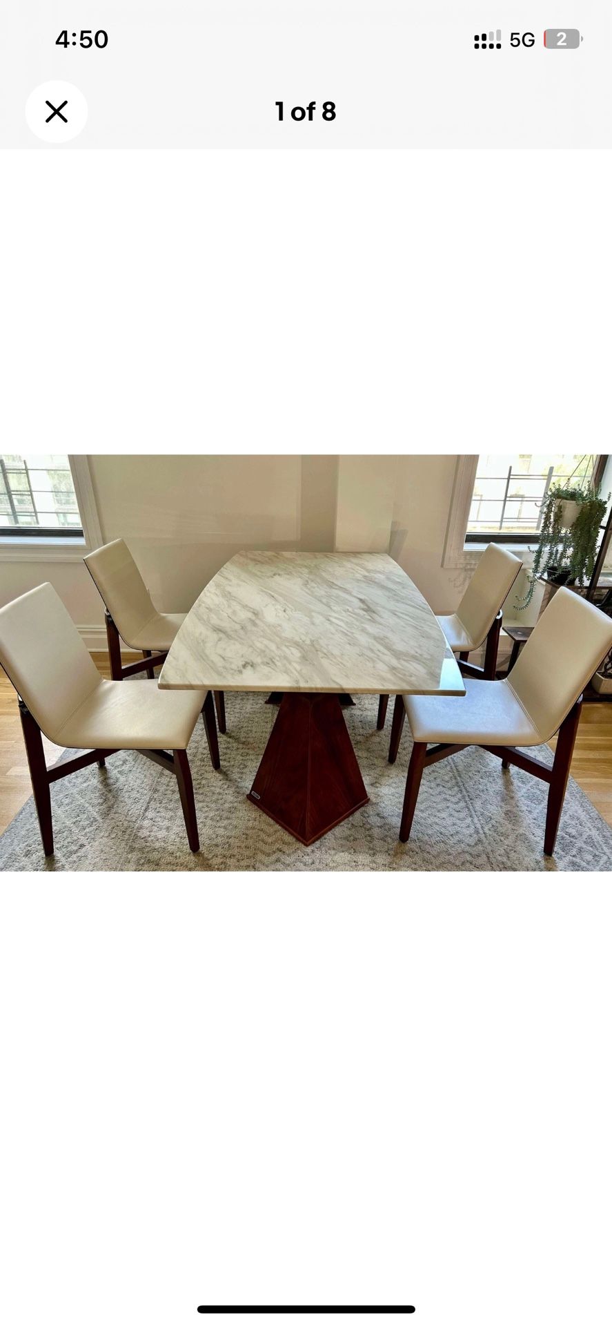 Modern Marble Dining Table with 4 White Leather Chairs – $1,500 (Retail $4,595)