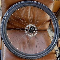 700c Double Wall Front Wheel. 700c double wall wheel, Kenda Kwick Drumlin bicycle tire. The tire sidewall indicates it is a 700x45c size, commonly use