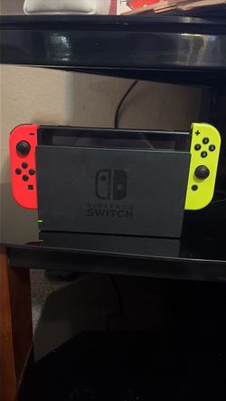 Nintendo Switch with Neon Red and Yellow Joy-Cons