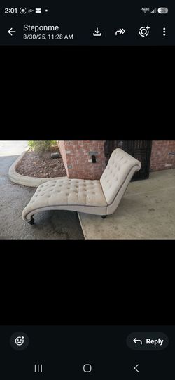 tufted beige Willow Arlo Interiors Cordella chaise lounge features dark wooden legs and elegant piped edges.