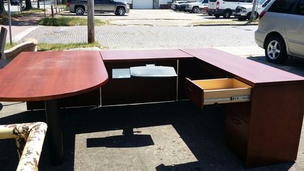 Very nice desk for a nice size office comes with key three drawers one top draw and a computer holder