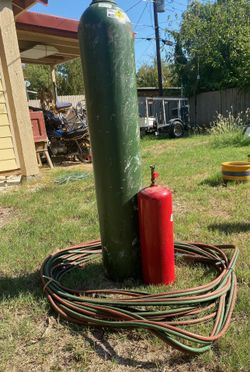Oxygen And Gas Tank With Hoses
