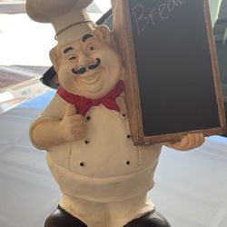 Chef Holding Chalkboard