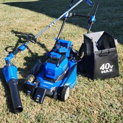 Self propelled battery powered mower and string trimmer/blower