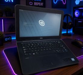 Dell Latitude 3380 Laptop - 8GB RAM / 128GB SSD - Linux Mint + Charger