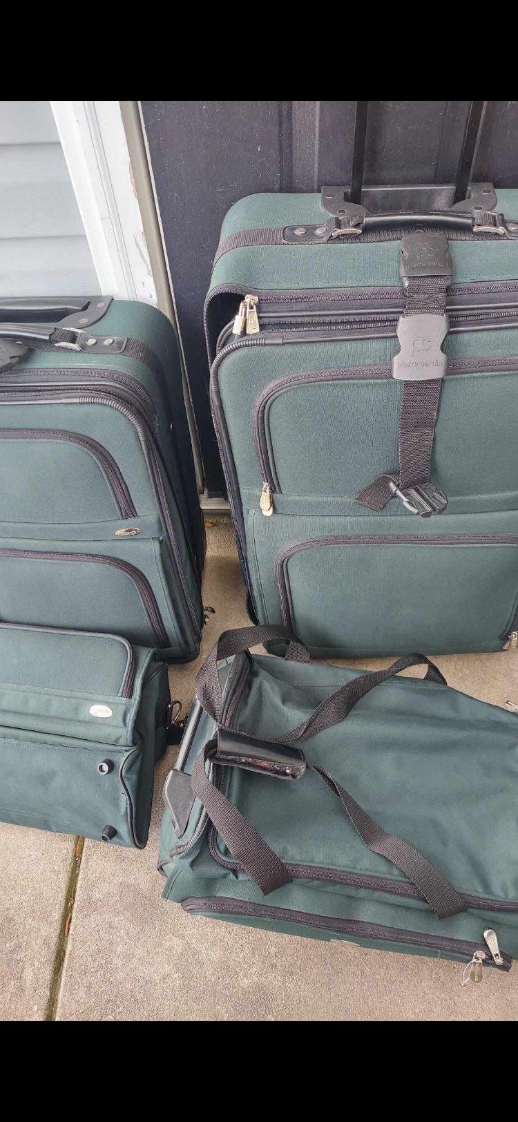 Four Suitcase $40