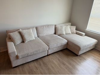 Beige L shaped couch