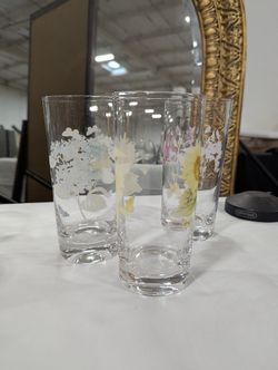 Set of Four Clear Glass Highball Tumblers with Assorted Floral Butterfly Designs