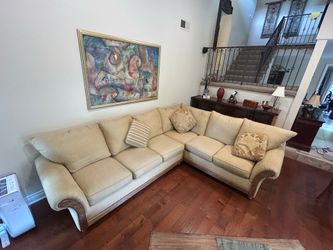 Tommy Bahama L-shaped sofa - beautiful wood trim