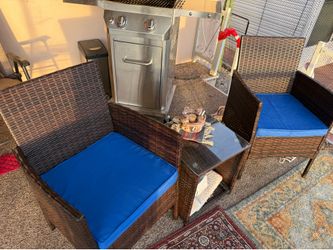 Two Patio chairs and end table. END TABLE IS HOLLOW inside to store patio accessories and it features a tempered glass top with suction cups to hold i
