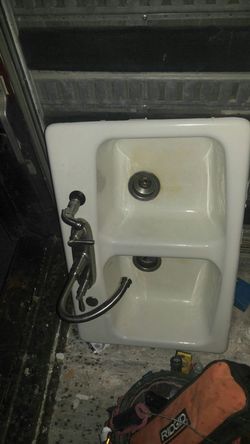 Cast iron sink . needs cleaned