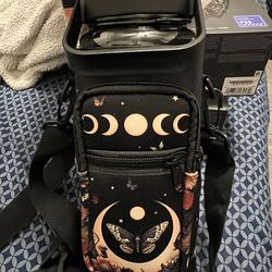 64oz plastic water bottle with butterfly carry pouch