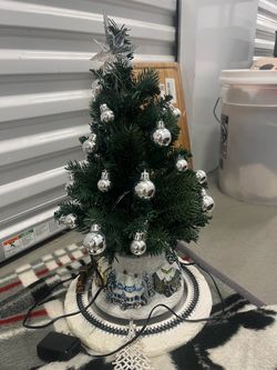 Light up xmas present and Christmas train that lights up and moves around