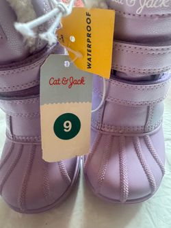 Soft lavender waterproof boots by Cat & Jack. Easy hook-and-loop straps for secure fit. Plush lining for cozy warmth. Grippy outsole for steady tracti