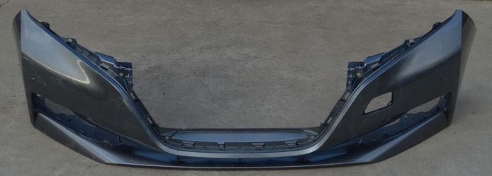 USED AFTERMARKET REF#U0633 || 2018-2022 NISSAN LEAF || FRONT BUMPER COVER ONLY