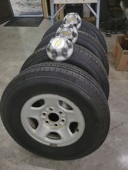 (4) CHEVY/GMC 6 LUG STEEL WHEELS & NEW TIRES