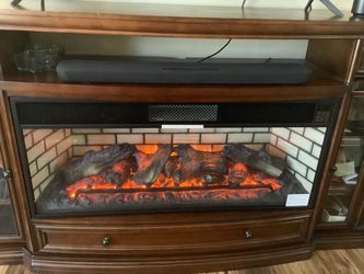 Wooden Electric Fireplace Entertainment Center. 41.1/2” H. 75” W. 20” D