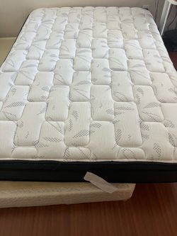 Full size mattress with a box
