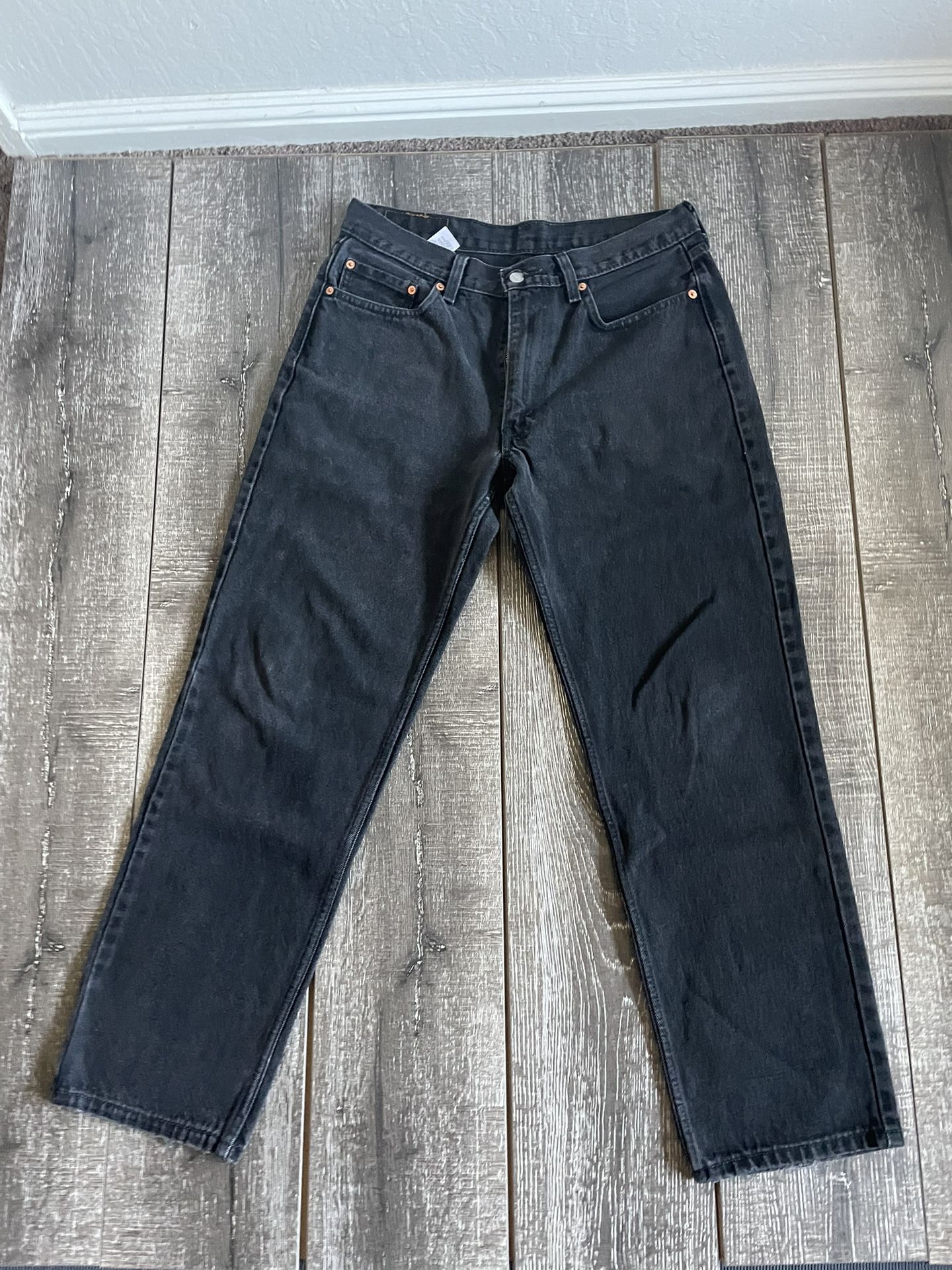 Black relaxed for Levi 550. Waist 33 and Length 32.