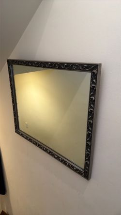 Silver detailed framed mirror