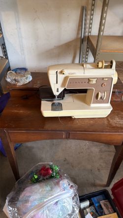 Singer sewing machine and table