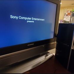 PS3 with Controller And 4 Games 