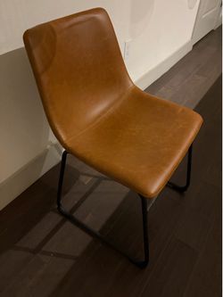 Tan/brown/orange leather chair