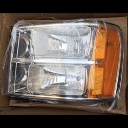 07-13 GMC sierra chrome and clear OEM style aftermarket driver side headlight