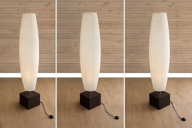 Modern paper lantern floor lamp with dark wood base and foot switch.
