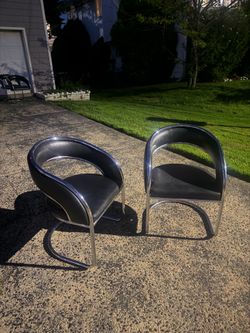 Retro style steel and leather dining chairs