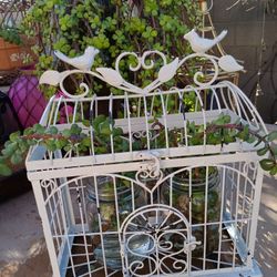 $25 Fun Metal 12"x14" Garden Decor. Comes with 3 Glass Jars Filled With Easy Care Elephant Bush