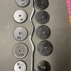 Weights Plates. / Curl Bar.              70 Dollars 