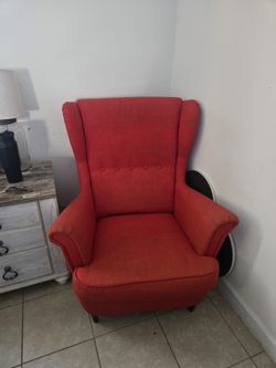 red wingback chair