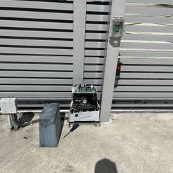 Electric gate shaking, dragging, or jamming? I fix chain, rollers, and tracks