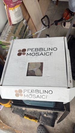 Two boxes of pebble tile
