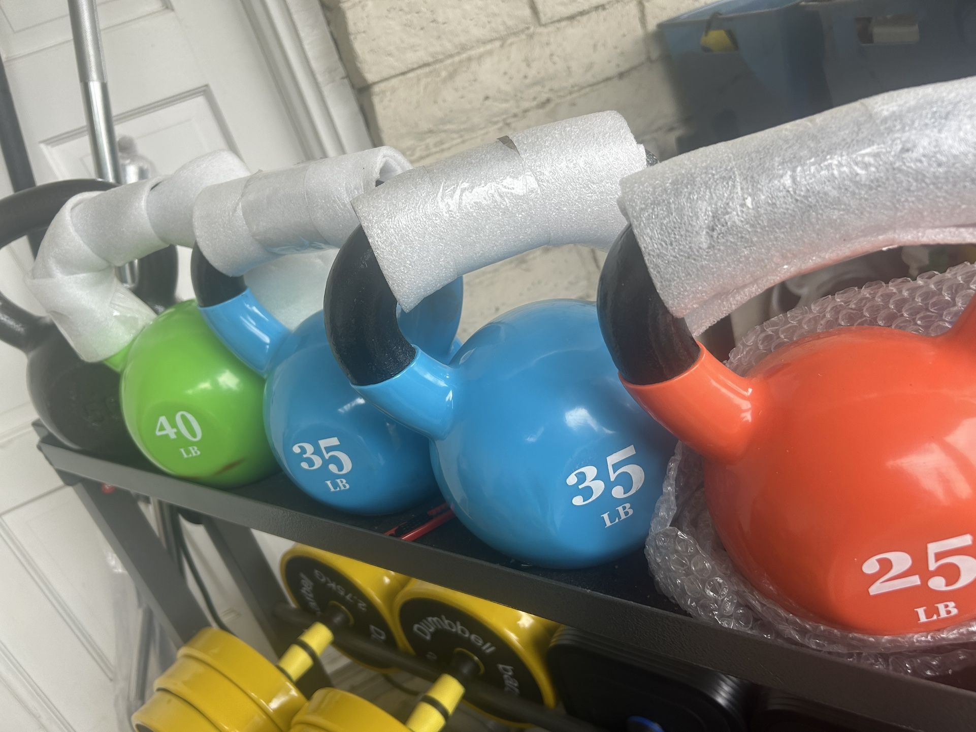 New kettle bells, a dollar a pound