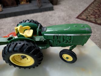 Diecast John Deere tractor and trailer