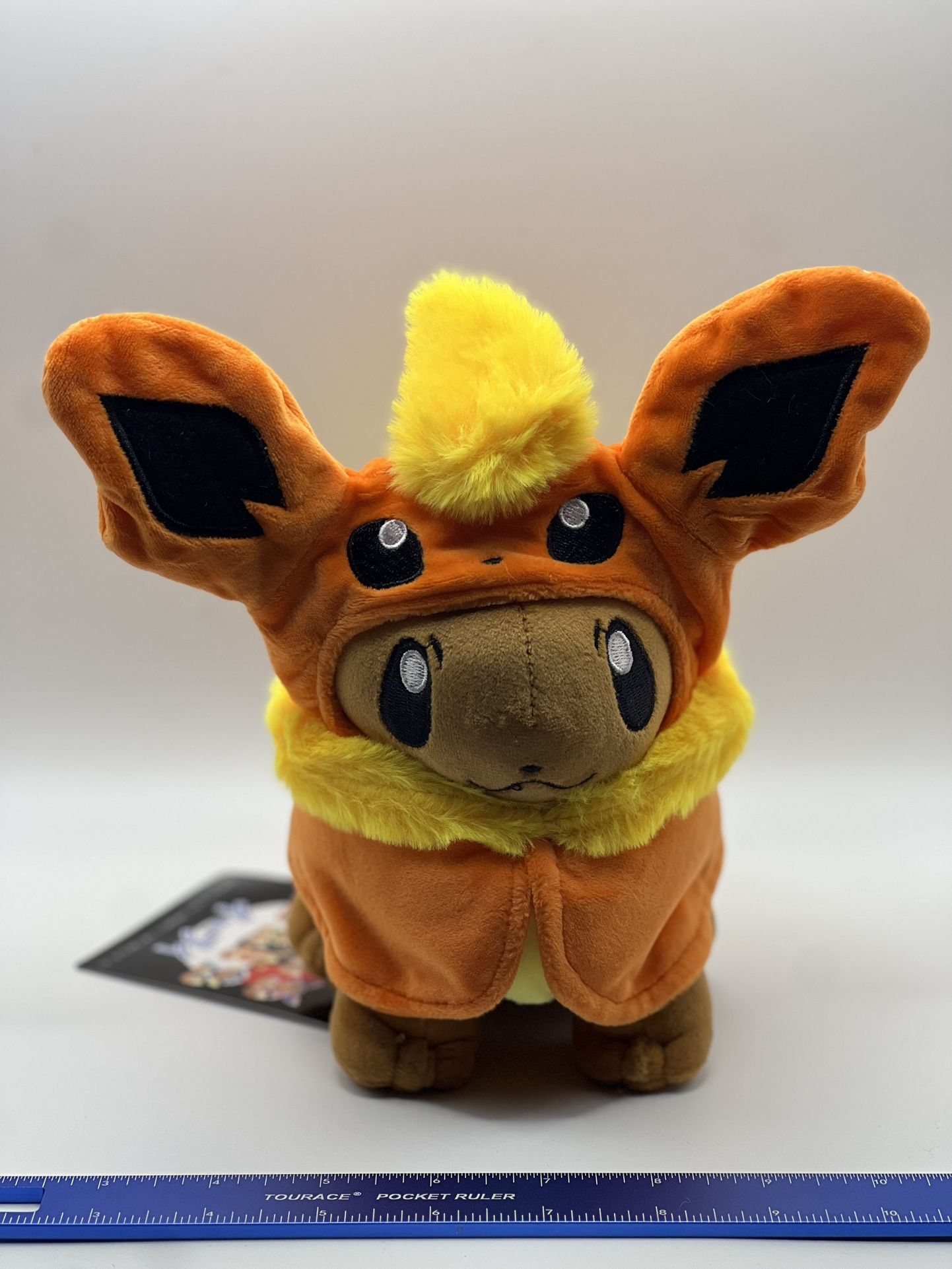 Eevee - Flareon Poncho Pokémon Plush 8”